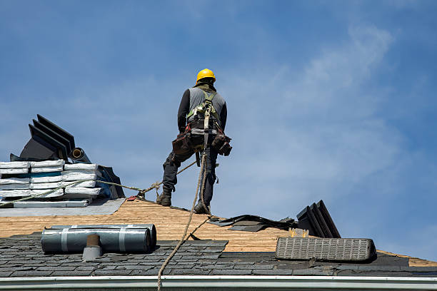 Professional Roofing technician working in Madrid, IA